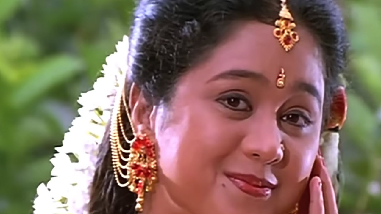 Un Marbil Vizhi Moodi Lyrics in Tamil